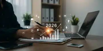 Woman reviewing financial statements on a laptop with charts and graphs, symbolizing a personal finance audit in 2026.